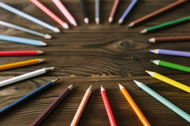 Multicolored pencils lying on a table