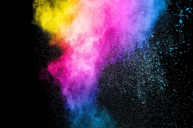 Фото Разноцветный взрыв порошка на черном фоне.