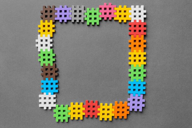 Multicolored puzzles on a gray background