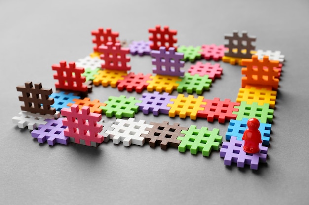 Multicolored puzzles on a gray background