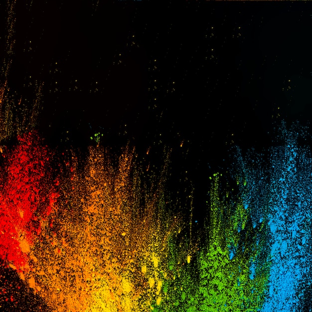 Photo multicolored rainbow style holi colors arranged against black background