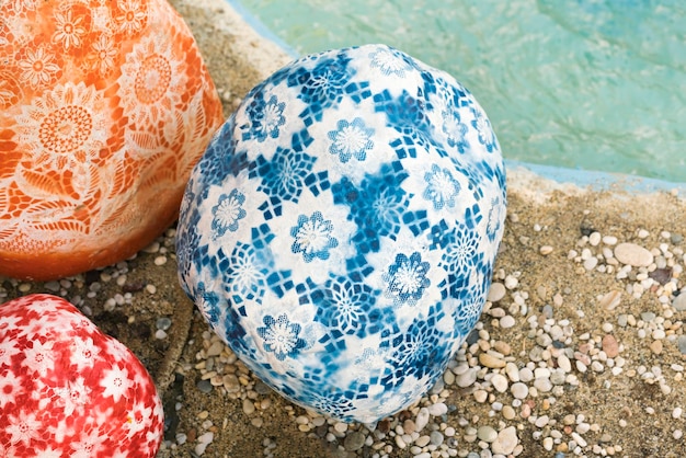 Multicolored skullcap on a stone background