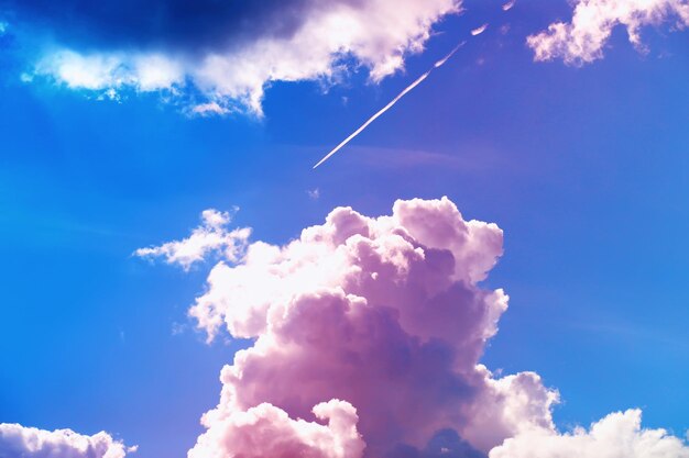 Multicolored sky background. High clouds in the summer sky. Meteorological observations of the sky.