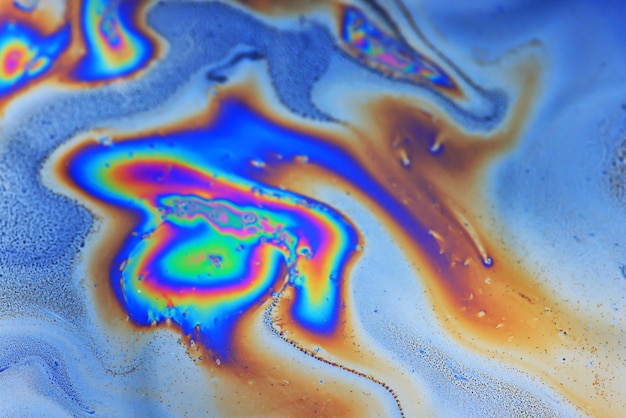 Foto fondo astratto della benzina del punto multicolore, fuoriuscita di petrolio astratta sull'acqua