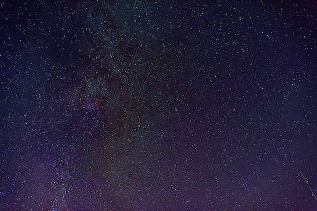 Photo multicolored starry sky with many stars and the milky way at night. scientific astrophotography of the cosmos with galaxies, nebulae and constellations