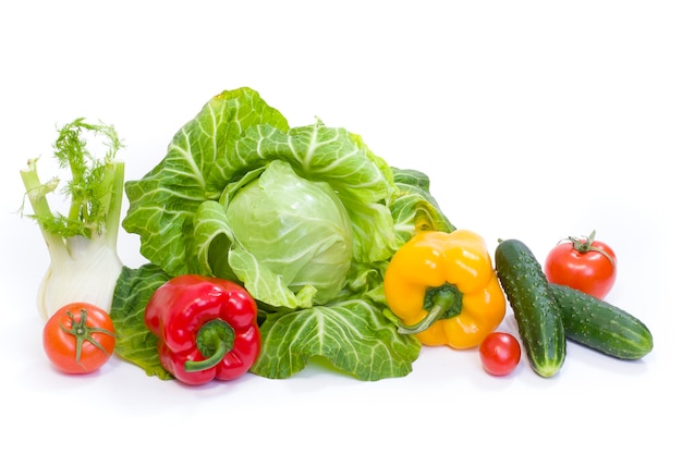 Multicolored vegetables on a white background