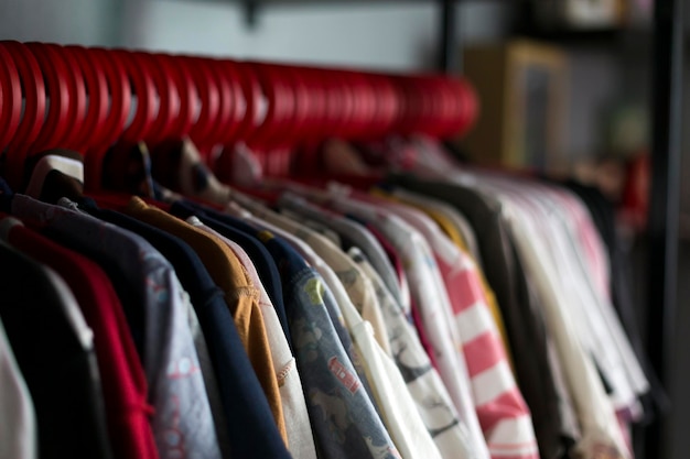 Photo multicoloured wardrobe on the hangers