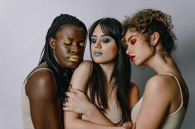 Multicultural group of beautiful women posing in underwear