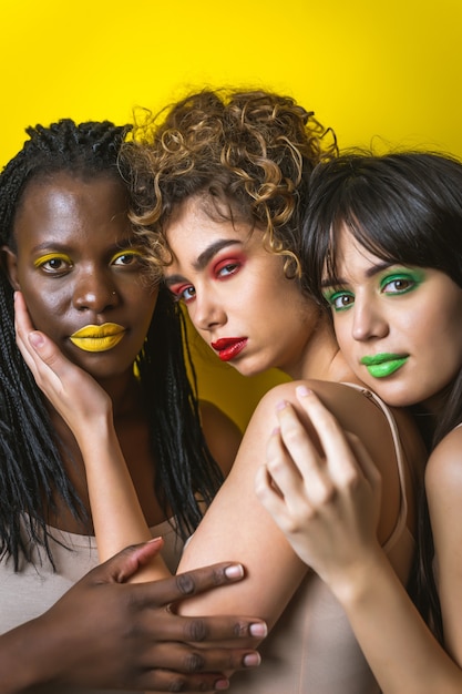 Multicultural group of beautiful women posing in underwear