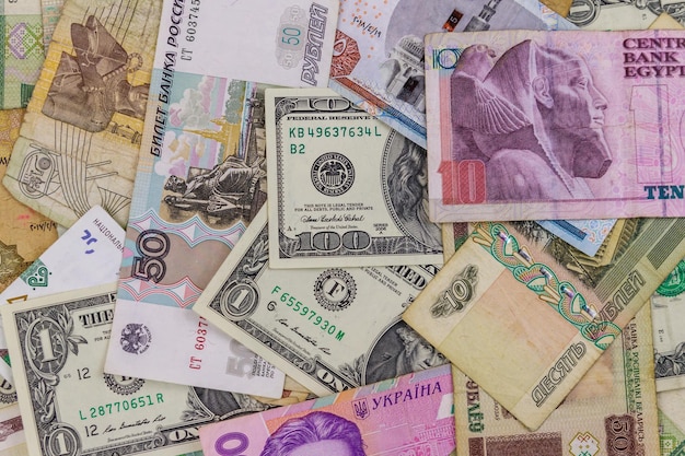 Фото Мультивалютный фон долларов сша российских рублей белорусских рублей египетских фунтов и украинских гривен
