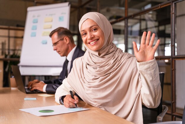 Multiethnic corporate business team meeting in the office for a strategic marketing plan - Office workers, entrepreneurs and company employee at work in a multinational company