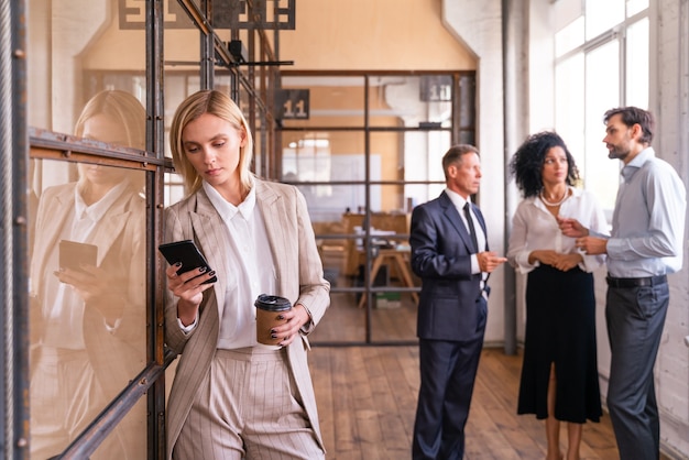 Multiethnic corporate business team meeting in the office for a strategic marketing plan - Office workers, entrepreneurs and company employee at work in a multinational company