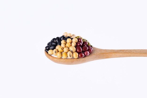 Multigrain 5 kinds of bean in wooden spoon isolated on white background Stop motion food and drink object design