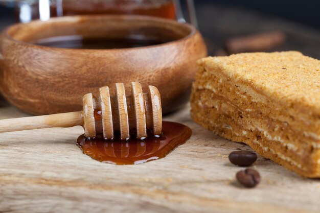 A multilayered piece of cake made of flour and cream filling