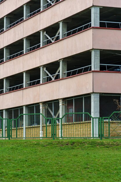 Multilevel modern parking for cars with modern security and theft protection systems A large multistorey reinforced concrete building for parking and storage of cars