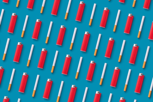 Несколько сигарет и зажигалок, выстроенных в ряд на синем фоне
