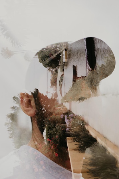 Photo multiple exposure of man in cap and building