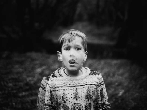 Photo multiple image of cute boy standing on land