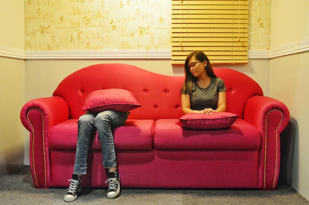 Photo multiple image of woman sitting on sofa