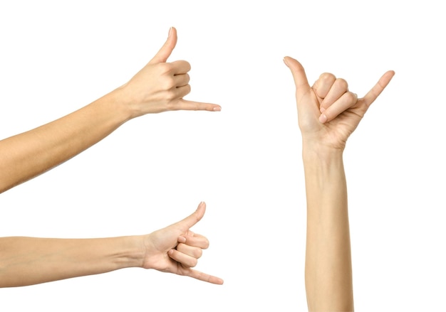 Multiple images set of female caucasian hand with french manicure showing Rock and Roll gesture