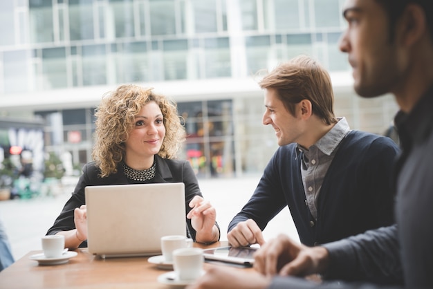 Multiracial business people working outdoor in town