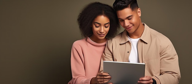 Multiracial couple using tablet for online banking