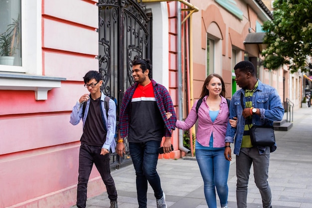 Multiracial friends going on shopping after lockdown