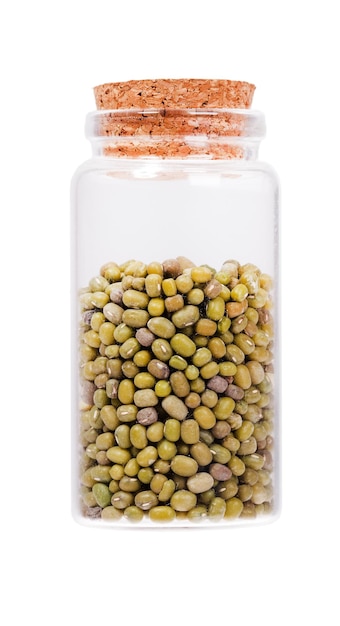 Mung beans in a glass bottle with cork stopper isolated on whit