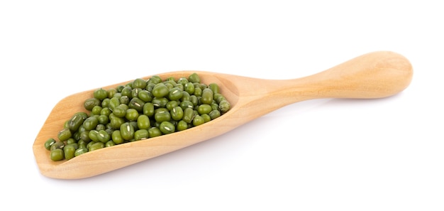 Mung beans in spoon isolated on white surface