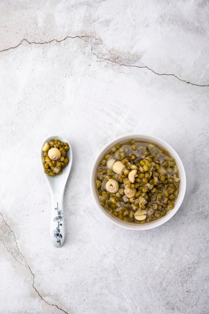 Mung beans on white wall