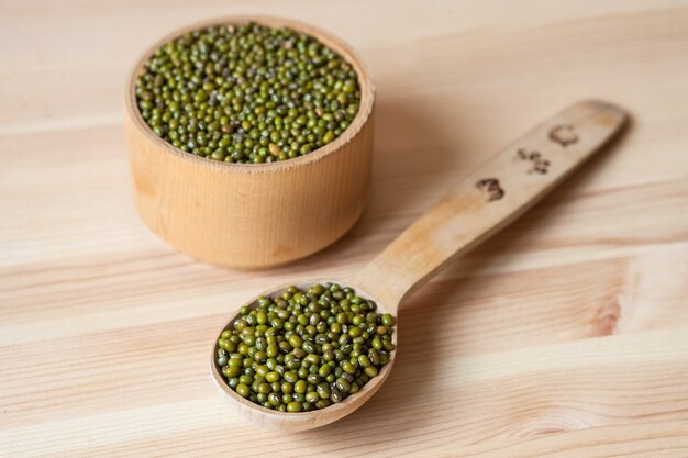 Mung beans on wooden table