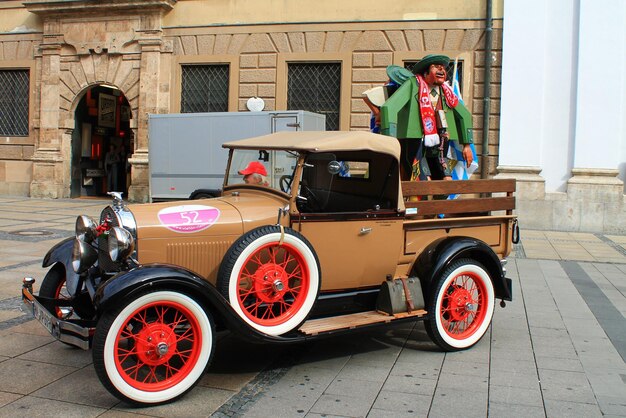 MUNICH GERMANY SEPTEMBER 25 2015 Retro car in the old city of Munich at the Oktoberfest Germany