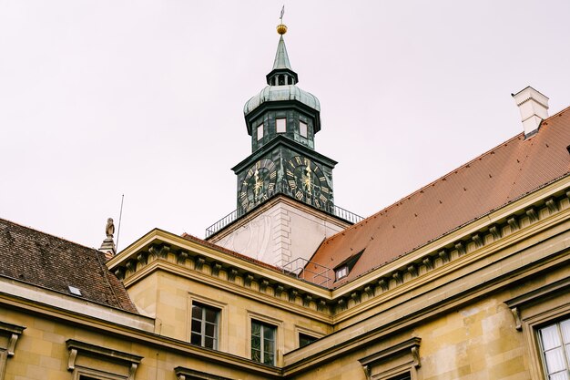 Munich residence tower with a clock on the facade