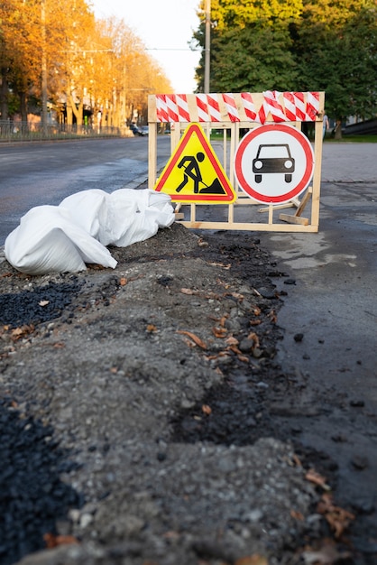 Municipal sign indicating road work aMunicipal sign indicating upcoming road works. Road works, repair sign.head.