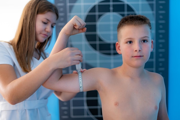 Muscle strength and volume analysis in children anthropometric upper arm circumference tape measurement