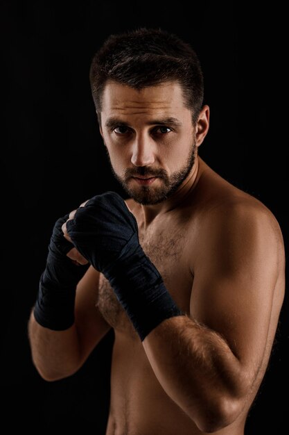 Muscular boxing man ready to fight