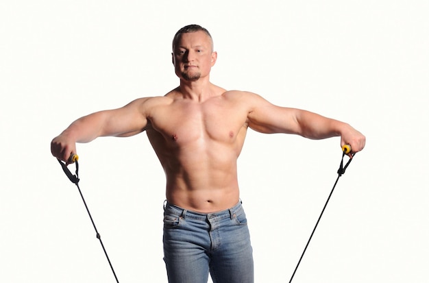 白い背景に分離された筋肉の男性の体