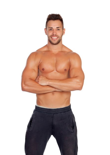 Photo muscular man showing his body isolated on white background