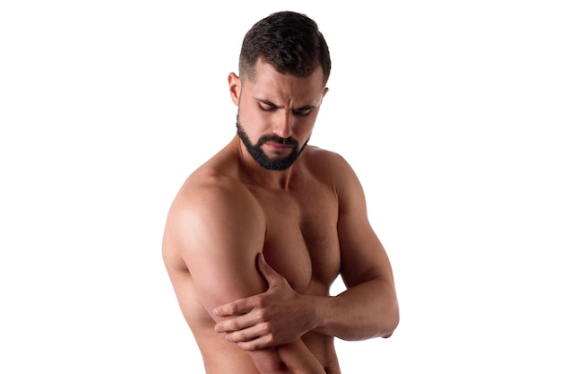 Muscular strong man with shoulder pain isolated on white background sportsman holds sore shoulder