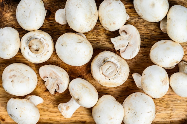 Mushroom champignon  in a bamboo bowl.