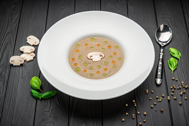 Mushroom cream soup Soup in a bowl Top view