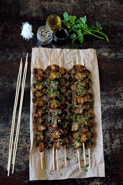 Mushroom kebabs with parsley and sea salt.