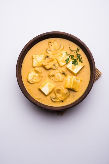 Mushroom Paneer curry or sabzi, served in a bowl. selective focus