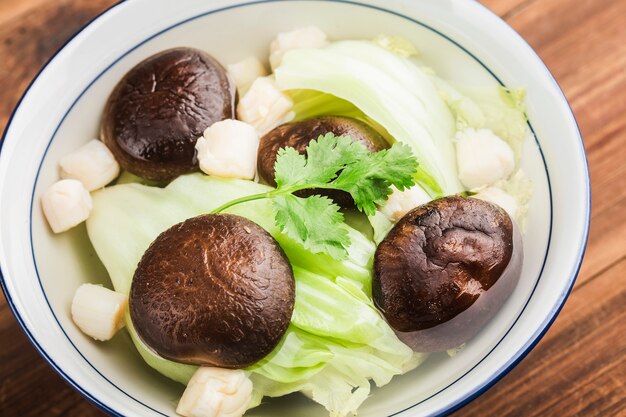 Mushroom and scallop soup with mustard