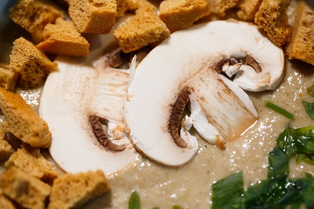 Mushroom soup puree with breadcrumbs and herbs