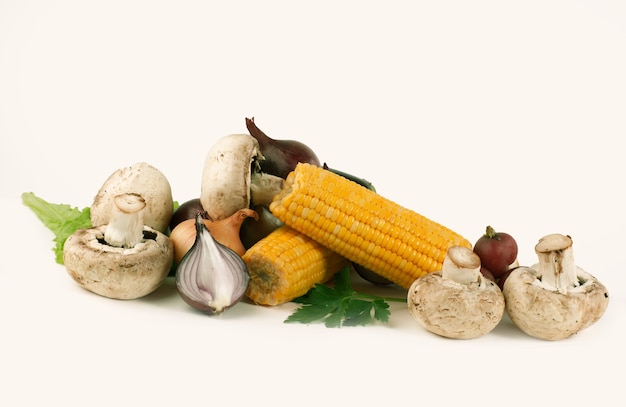 Mushrooms and fresh vegetables.isolated on a white background.photo with copy space