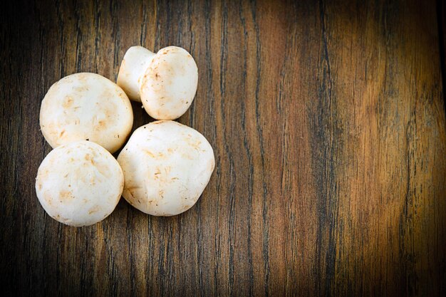 Mushrooms on a Wooden Board.