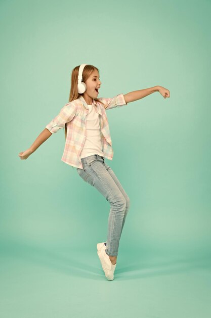 Music drives me dance Girl child listen music with modern headphones Kid little girl listen song headphones Music account playlist Customize your music Listen track for dancing Dancing school