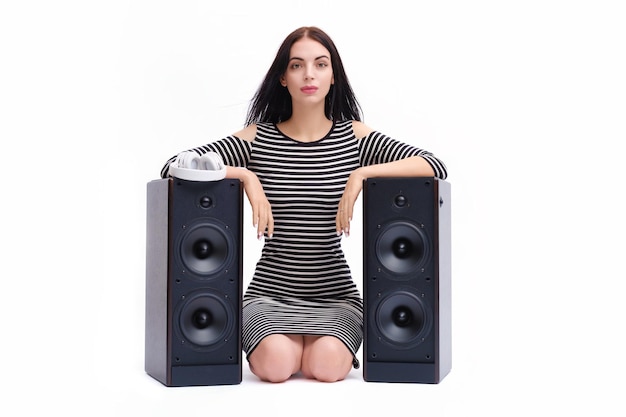 Photo music enthusiast with stereo speakers