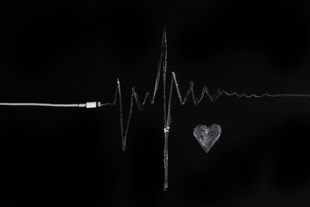 Music, pulse, heart. Black background, minimalism. 